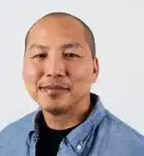 Professional headshot photo of Prof Douglas Yu