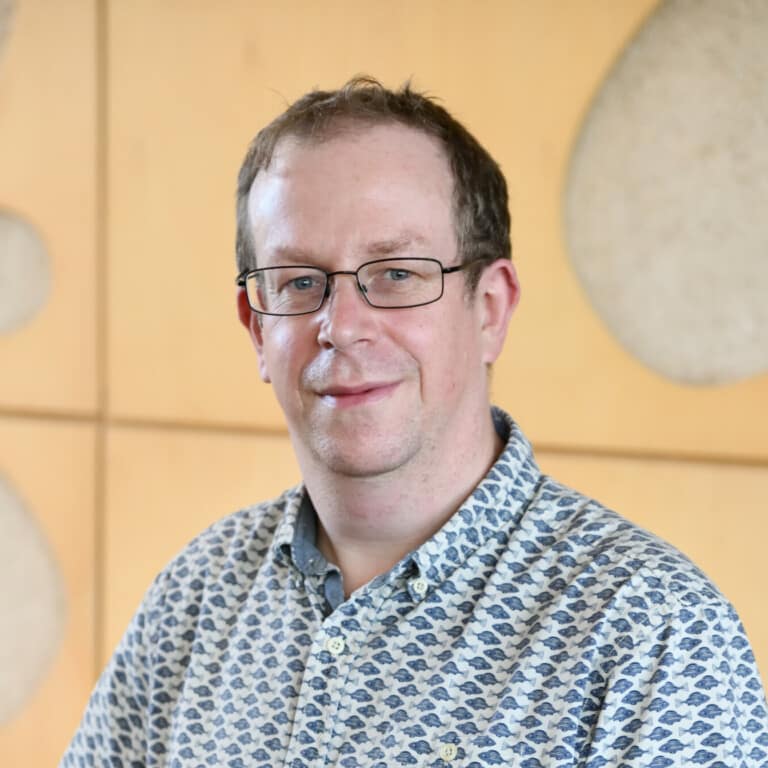 Professional headshot photo of Prof Daniel Brewer